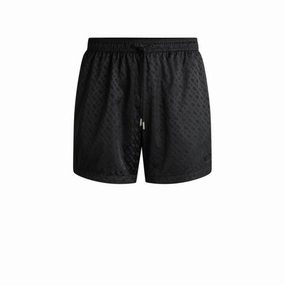 Swim shorts with all-over tonal monograms