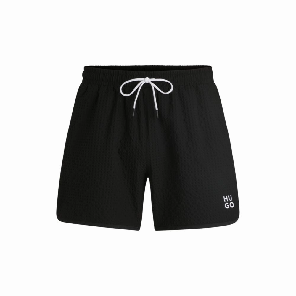 Waffle-structured swim shorts with embroidered stacked logo